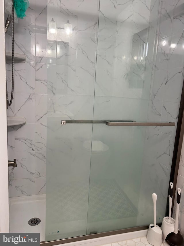 bathroom featuring a stall shower