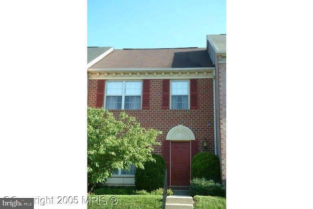 multi unit property featuring brick siding