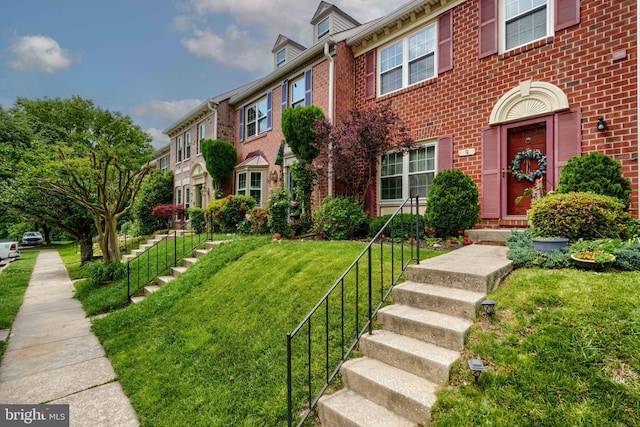 9 Kathsway Ct, Baltimore, MD 21234 - view of front of home with brick siding and a front yard