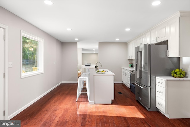 194 Black Cub Run Ln, Harpers Ferry, WV 25425 - kitchen with high end refrigerator, range with electric cooktop, light countertops, white cabinetry, and recessed lighting