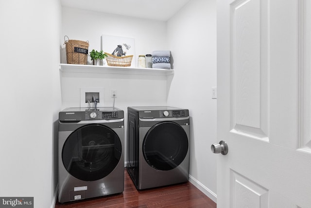 194 Black Cub Run Ln, Harpers Ferry, WV 25425 - laundry room with washer and dryer, dark wood-style flooring, and baseboards