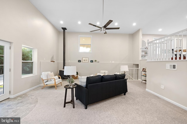 194 Black Cub Run Ln, Harpers Ferry, WV 25425 - living room with ceiling fan, carpet floors, plenty of natural light, a wood stove, and recessed lighting
