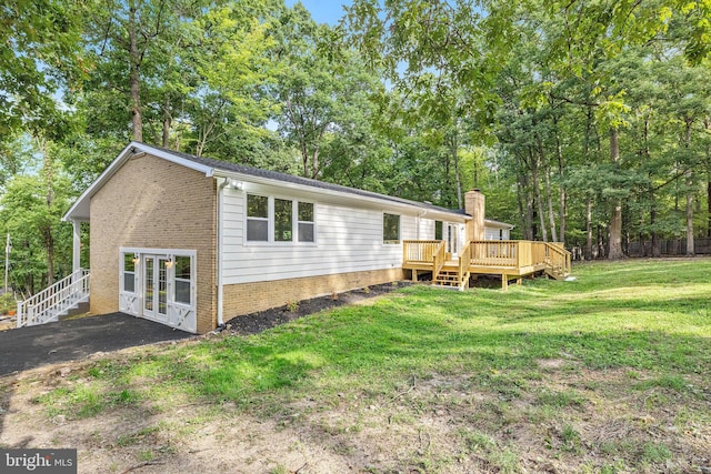 194 Black Cub Run Ln, Harpers Ferry, WV 25425 - rear view of property with french doors, a wooden deck, a lawn, and brick siding