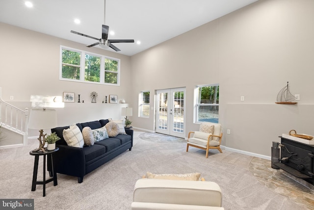 194 Black Cub Run Ln, Harpers Ferry, WV 25425 - living area featuring carpet flooring, french doors, a ceiling fan, baseboards, and a high ceiling