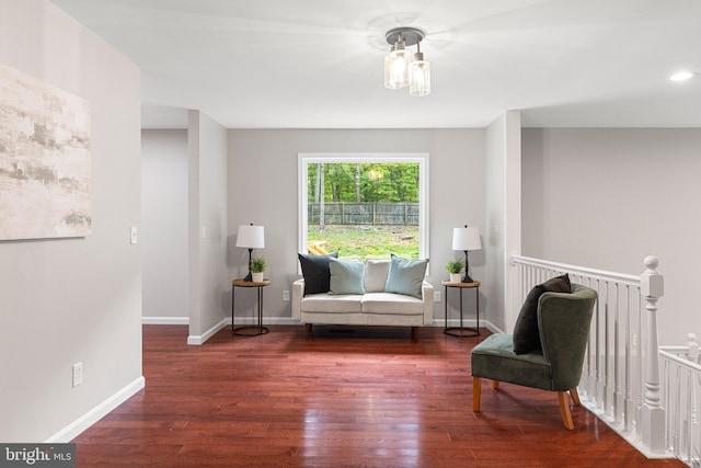 194 Black Cub Run Ln, Harpers Ferry, WV 25425 - sitting room with wood finished floors, baseboards, and an upstairs landing