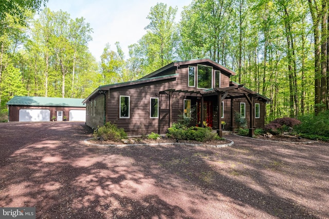 1088 Imperial Dr, Mohnton, PA 19540 - view of front of home featuring a garage, an outdoor structure, and a pergola