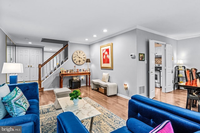 352 Paoli Woods Dr, Paoli, PA 19301 - living area featuring stairs, crown molding, baseboards, recessed lighting, and wood finished floors