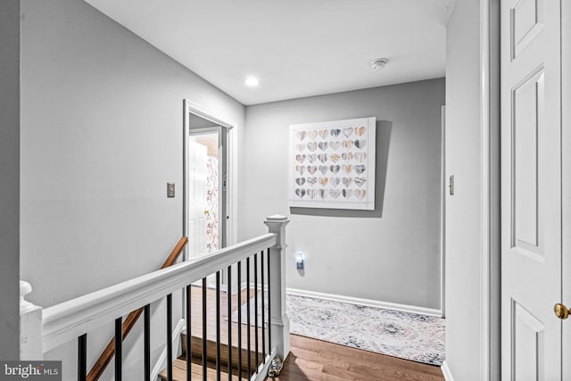 352 Paoli Woods Dr, Paoli, PA 19301 - hall featuring an upstairs landing, wood finished floors, baseboards, and recessed lighting