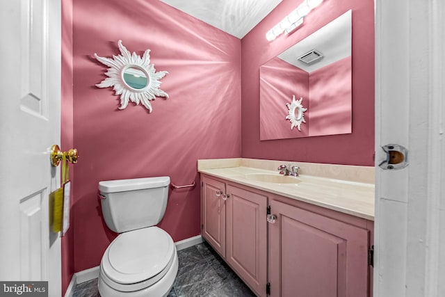 352 Paoli Woods Dr, Paoli, PA 19301 - bathroom with baseboards, toilet, vanity, and marble finish flooring