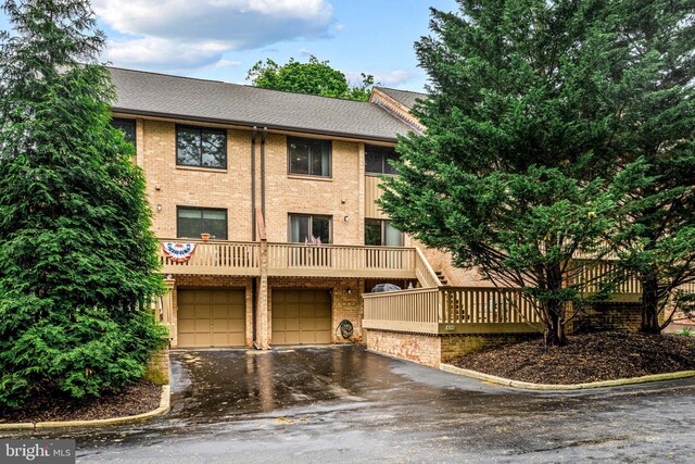 352 Paoli Woods Dr, Paoli, PA 19301 - view of property with a garage, brick siding, driveway, and a shingled roof