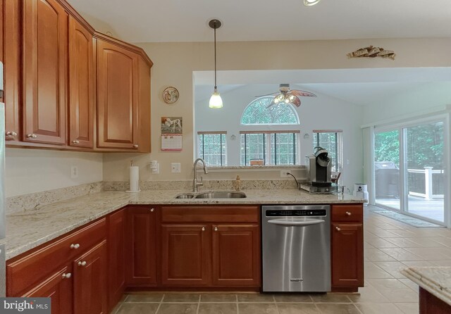 13605 Sugar Mill Ct, Waldorf, MD 20601 - kitchen featuring stainless steel dishwasher, a sink, ceiling fan, vaulted ceiling, and light stone countertops