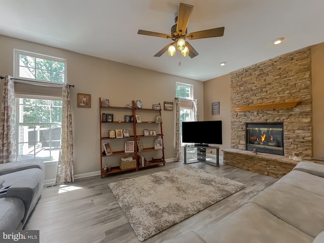 13605 Sugar Mill Ct, Waldorf, MD 20601 - living room with ceiling fan, wood finished floors, a fireplace, baseboards, and recessed lighting