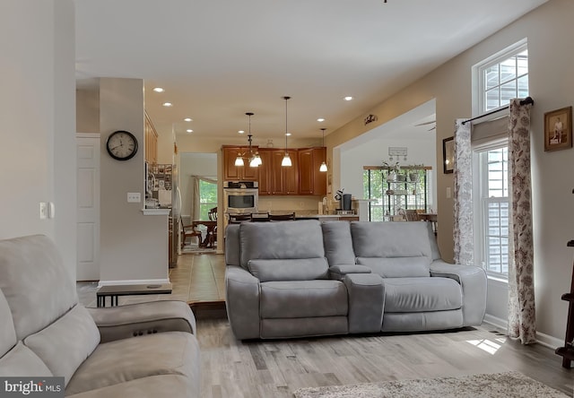 13605 Sugar Mill Ct, Waldorf, MD 20601 - living area featuring baseboards, recessed lighting, and light wood-style flooring