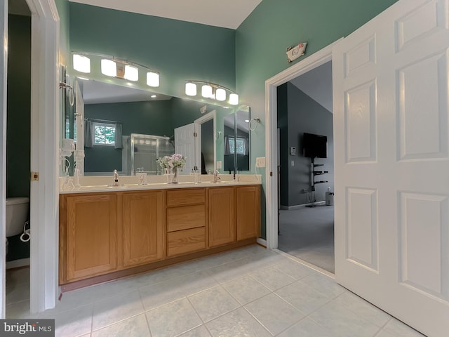 13605 Sugar Mill Ct, Waldorf, MD 20601 - bathroom featuring double vanity, toilet, a stall shower, and tile patterned flooring