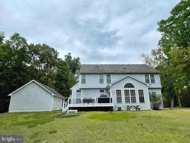 13605 Sugar Mill Ct, Waldorf, MD 20601 - rear view of property with a wooden deck and a yard