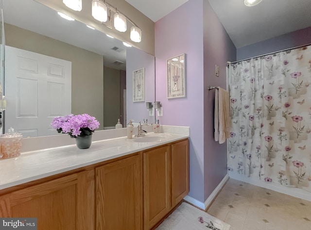 13605 Sugar Mill Ct, Waldorf, MD 20601 - full bathroom with vanity, baseboards, a shower with shower curtain, and tile patterned floors