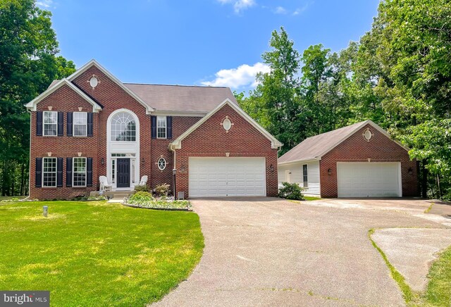 13605 Sugar Mill Ct, Waldorf, MD 20601 - colonial inspired home featuring brick siding and a front yard