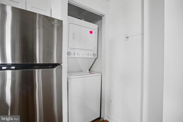 1001 Saint Paul St Unit 9F, Baltimore, MD 21202 - laundry room with estacked washer and dryer