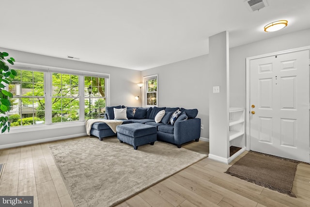 2224 Springwood Dr Unit 102A, Reston, VA 20191 - living area featuring hardwood / wood-style flooring and baseboards