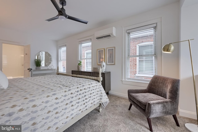 carpeted bedroom featuring a wall mounted air conditioner, baseboards, and ceiling fan
