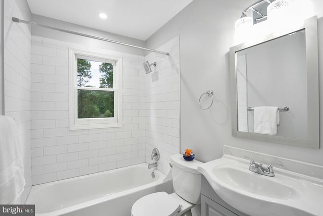 bathroom featuring toilet, vanity, shower / bath combination, and recessed lighting