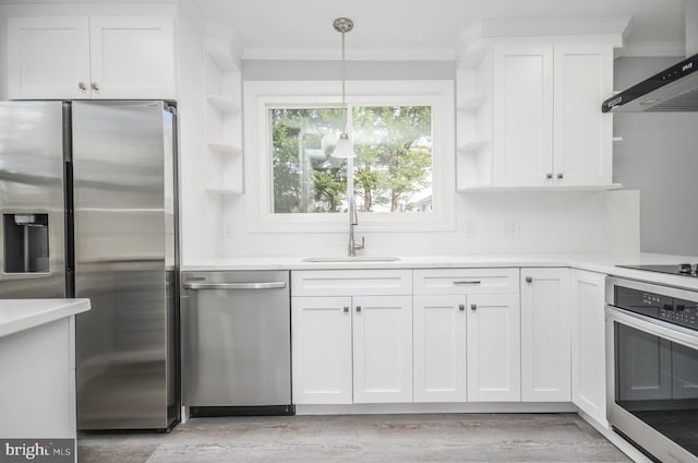 7009 Adelphi Rd, Hyattsville, MD 20782 - kitchen featuring stainless steel appliances, a sink, open shelves, wall chimney exhaust hood, and crown molding