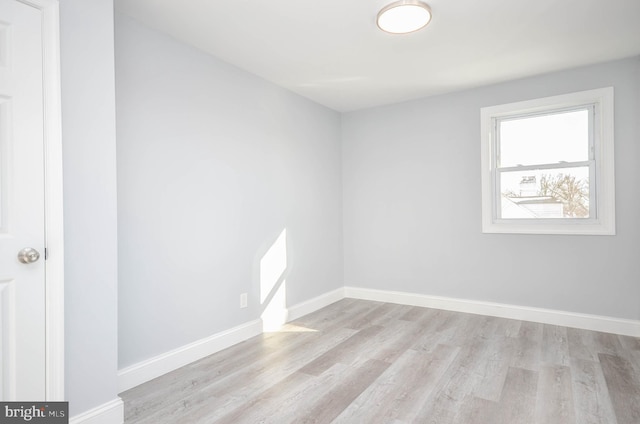 7009 Adelphi Rd, Hyattsville, MD 20782 - empty room with wood finished floors and baseboards