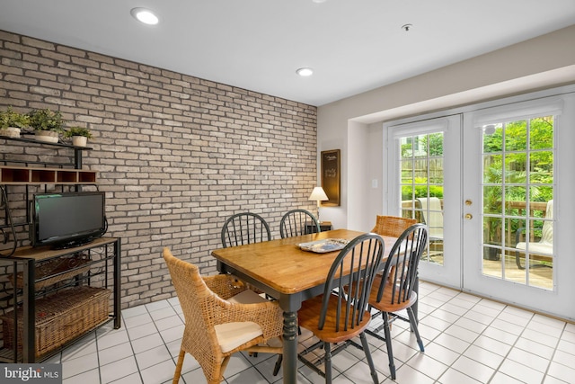 10938 Rocky Mount Way, Silver Spring, MD 20902 - dining area featuring brick wall, light tile patterned floors, french doors, and recessed lighting