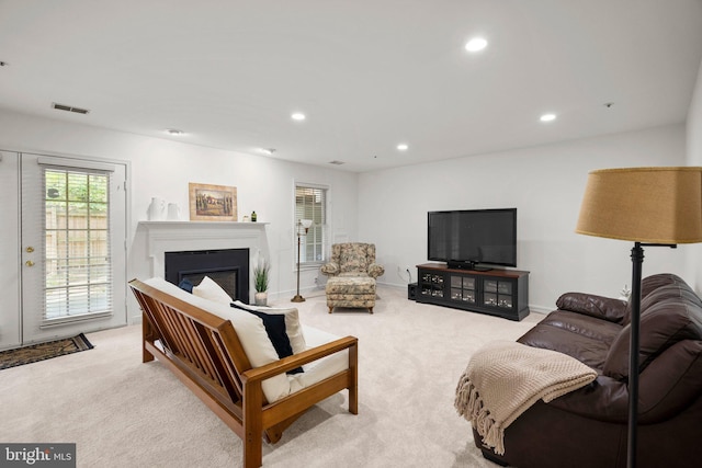 10938 Rocky Mount Way, Silver Spring, MD 20902 - carpeted living area with recessed lighting, a glass covered fireplace, and baseboards