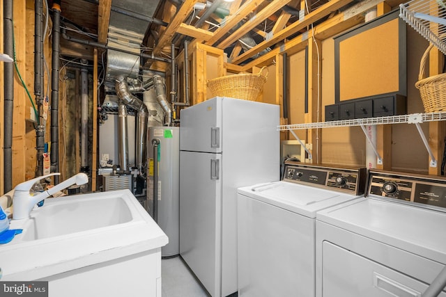 10938 Rocky Mount Way, Silver Spring, MD 20902 - washroom with gas water heater and separate washer and dryer