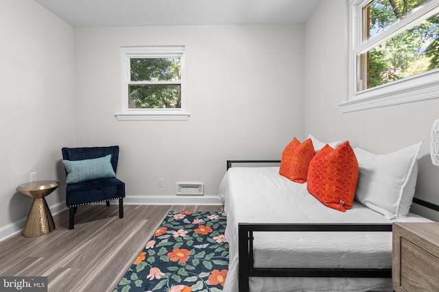 1102 Jackson Ave, Takoma Park, MD 20912 - bedroom featuring wood finished floors and baseboards