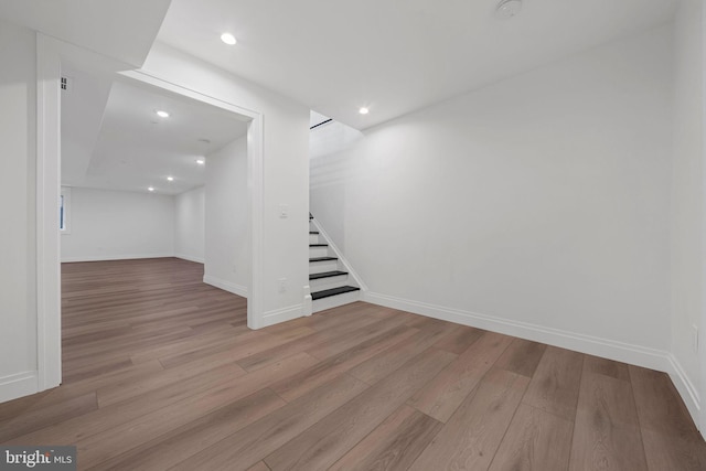 1615 S 22nd St, Philadelphia, PA 19145 - finished below grade area with wood finished floors, stairs, baseboards, and recessed lighting