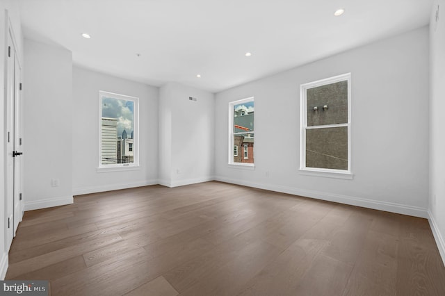 1615 S 22nd St, Philadelphia, PA 19145 - unfurnished room with wood finished floors, baseboards, and recessed lighting