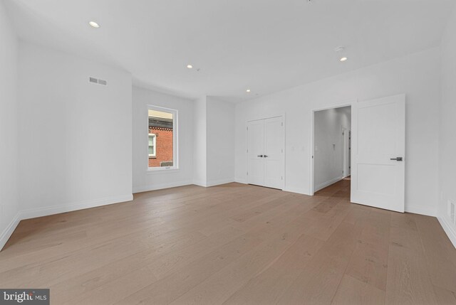 1615 S 22nd St, Philadelphia, PA 19145 - empty room with light wood finished floors, recessed lighting, and baseboards