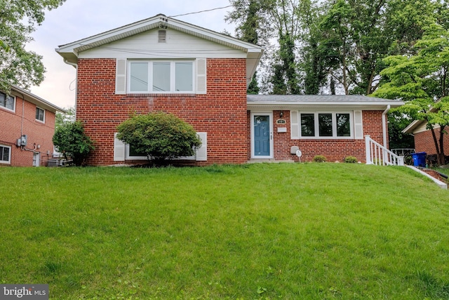 808 Gregorio Dr, Silver Spring, MD 20901 - view of front facade featuring brick siding and a front lawn
