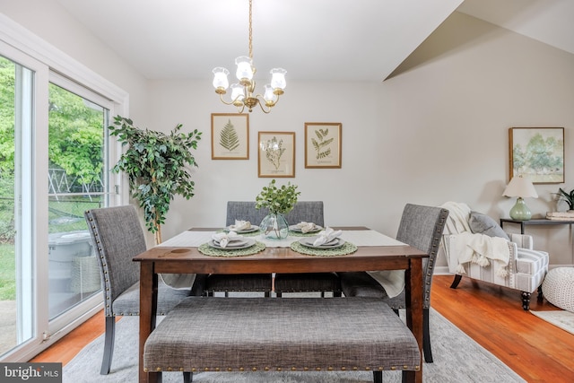 808 Gregorio Dr, Silver Spring, MD 20901 - dining space with light wood finished floors and a chandelier