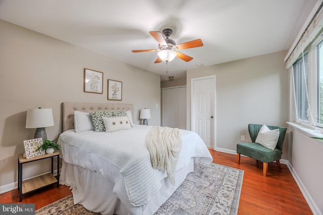 808 Gregorio Dr, Silver Spring, MD 20901 - bedroom featuring baseboards, wood finished floors, ceiling fan, and a closet