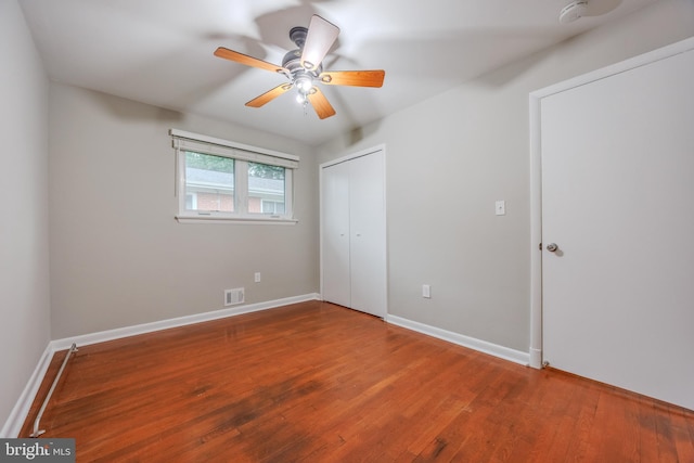 808 Gregorio Dr, Silver Spring, MD 20901 - unfurnished bedroom featuring hardwood / wood-style flooring, a closet, baseboards, and a ceiling fan
