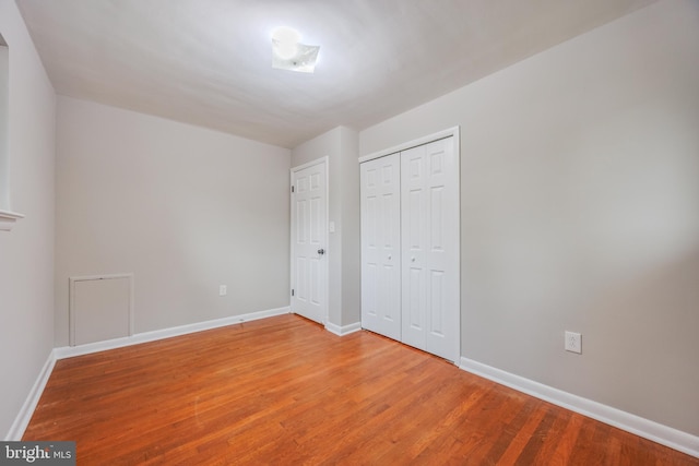 808 Gregorio Dr, Silver Spring, MD 20901 - unfurnished bedroom featuring light wood finished floors, baseboards, and a closet