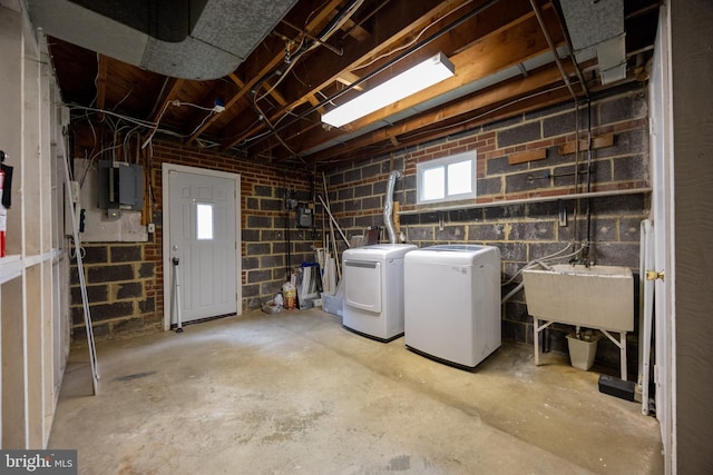 808 Gregorio Dr, Silver Spring, MD 20901 - below grade area featuring independent washer and dryer, a sink, concrete block wall, and electric panel