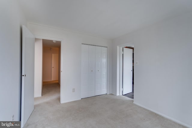 10300 Bushman Dr Unit 209, Oakton, VA 22124 - unfurnished bedroom with carpet floors, a closet, and baseboards