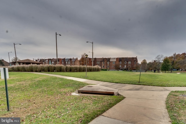 10300 Bushman Dr Unit 209, Oakton, VA 22124 - surrounding community featuring a residential view and a lawn