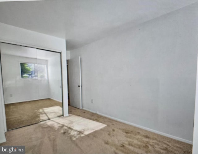 7212 Donnell Pl Unit B-5, District Heights, MD 20747 - unfurnished bedroom with carpet and a closet