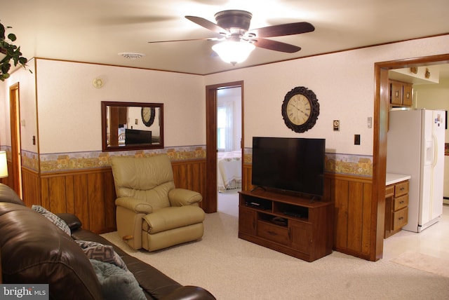 13920 Heavenly Acres Rdg, Hancock, MD 21750 - living room with ceiling fan, light carpet, a wainscoted wall, and wooden walls