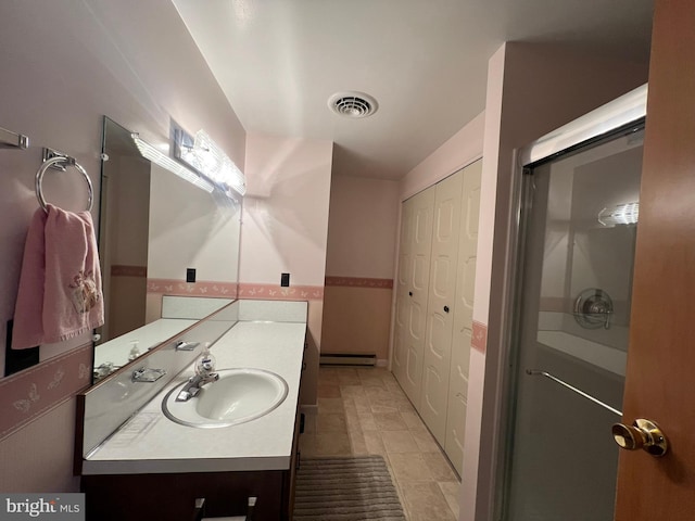 13920 Heavenly Acres Rdg, Hancock, MD 21750 - bathroom featuring vanity, baseboard heating, and a closet
