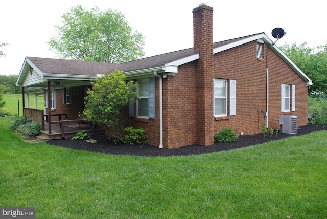 13920 Heavenly Acres Rdg, Hancock, MD 21750 - view of property exterior with central AC unit, a chimney, a yard, and brick siding