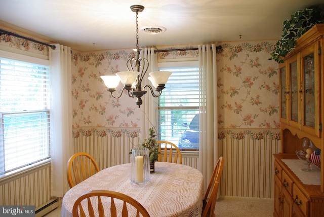13920 Heavenly Acres Rdg, Hancock, MD 21750 - dining area featuring wallpapered walls, healthy amount of natural light, a chandelier, and a baseboard heating unit