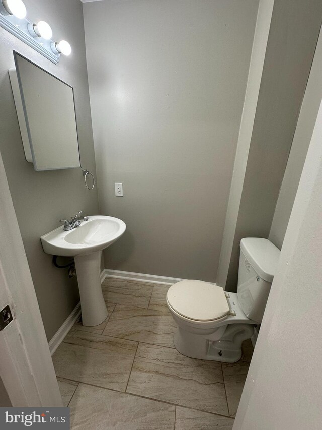 35 Preston Ave, Voorhees, NJ 08043 - half bathroom with toilet and baseboards