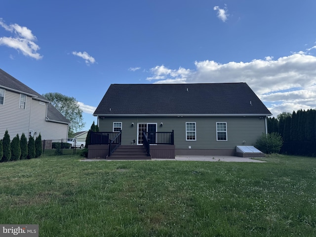 rear view of house with a deck