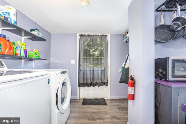 108 Fairfield St, Newville, PA 17241 - clothes washing area with separate washer and dryer, wood finished floors, and baseboards